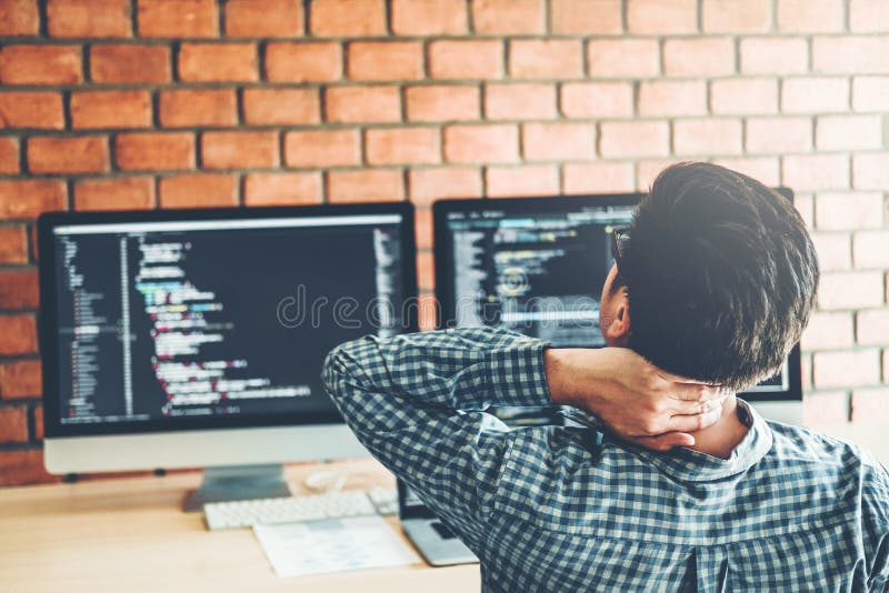 Relaxing Developing programmer Development Website design and coding technologies working in software company office. Developing programmer stock images, royalty-free photos and pictures
