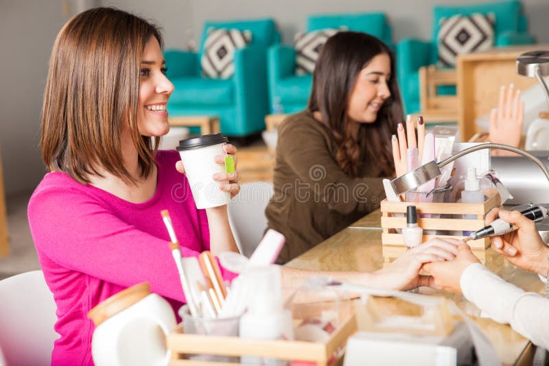 Relaxing and drinking tea at a nail salon