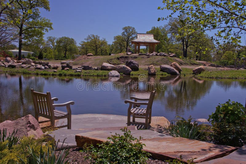 Relaxing place with chairs on a lakeshore