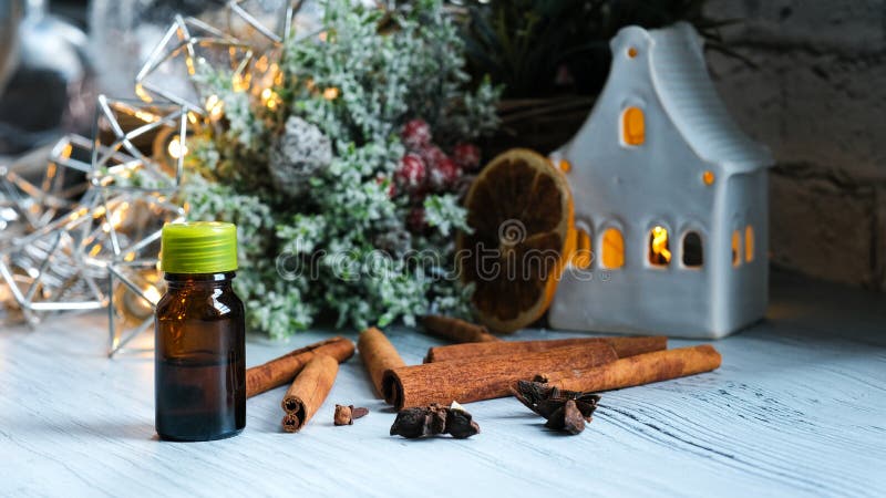 Relaxing Winter Season Essential Oils Blend. Dark Glass Bottles, Cinnamon,  Orange, Pine Twigs, Anise Stock Image - Image of holiday, anise: 158100767