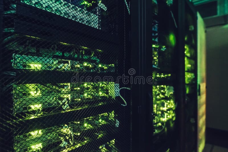 Fantastic view of the mainframe in the data center rows. Big data center full of rack servers. Data centre interface. Fantastic view of the mainframe in the data center rows. Big data center full of rack servers. Data centre interface.