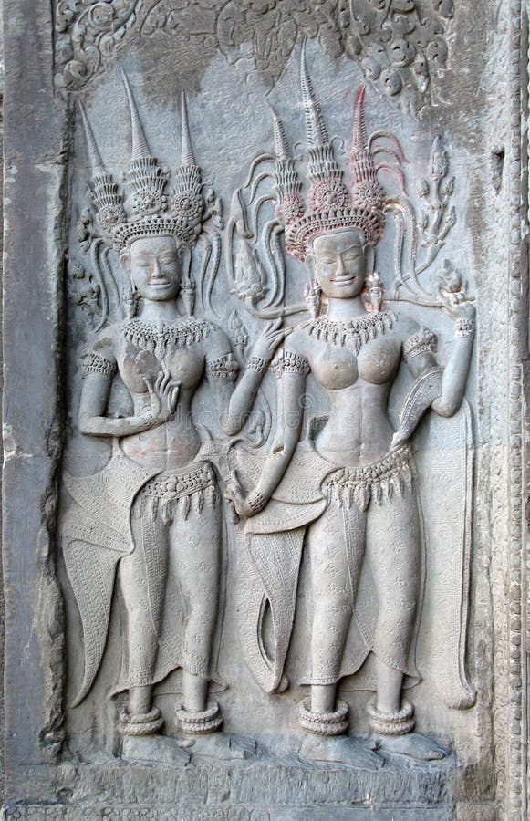 Bas relief of two dancing women, at Angkor Wat, Cambodia. Bas relief of two dancing women, at Angkor Wat, Cambodia