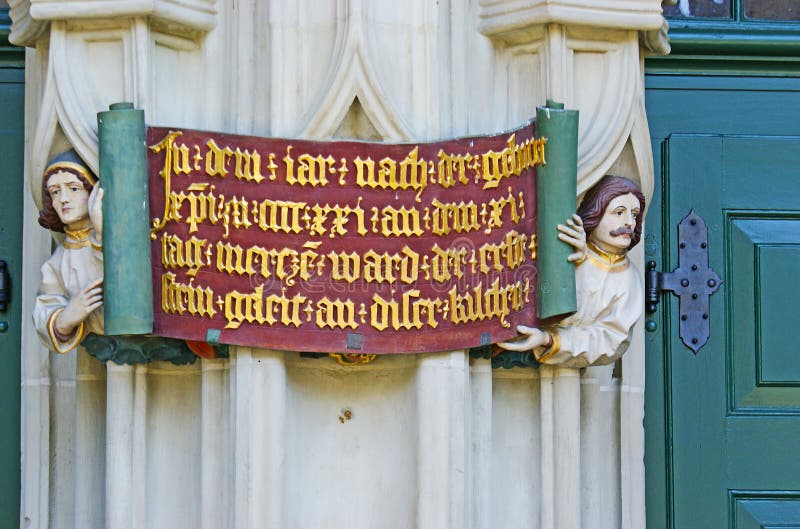 Relief inscription on Munster in Berne royalty free stock photo Relief inscription on Munster in Berne royalty free stock photo