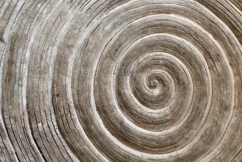 Relief pattern on a stone in the form of a spiral