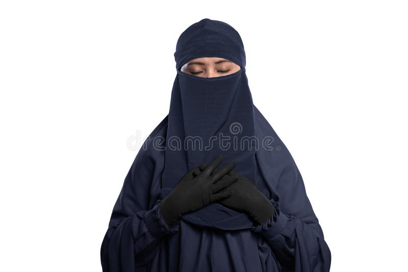 Religious asian muslim woman wearing hijab and niqab