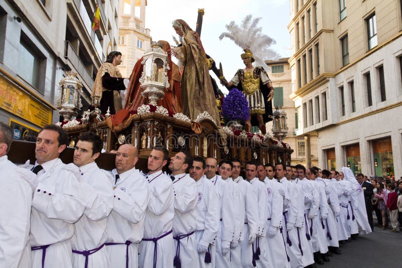 Bearers carrying religious images during processions in Holy Week at Malaga, Spain. Week processions stock images, royalty-free photos and pictures