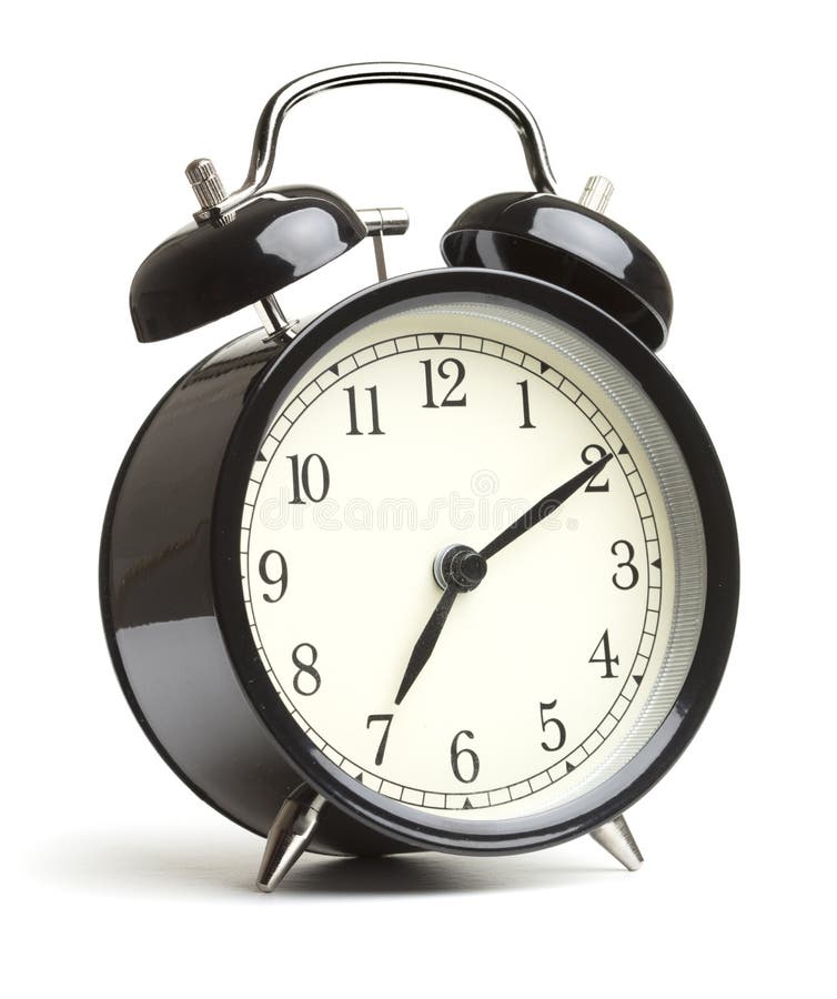 Reloj de alarma aislado en el fondo blanco imagen de archivo libre de regalías Reloj de alarma aislado en el fondo blanco imagen de archivo libre de regalías