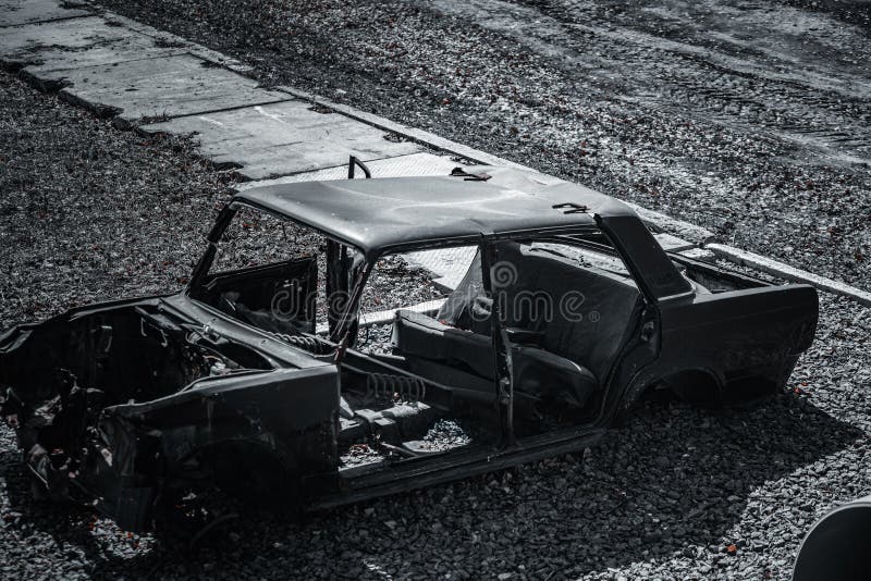 Remains of Charred Car after Explosion or Accident. View of Frame of