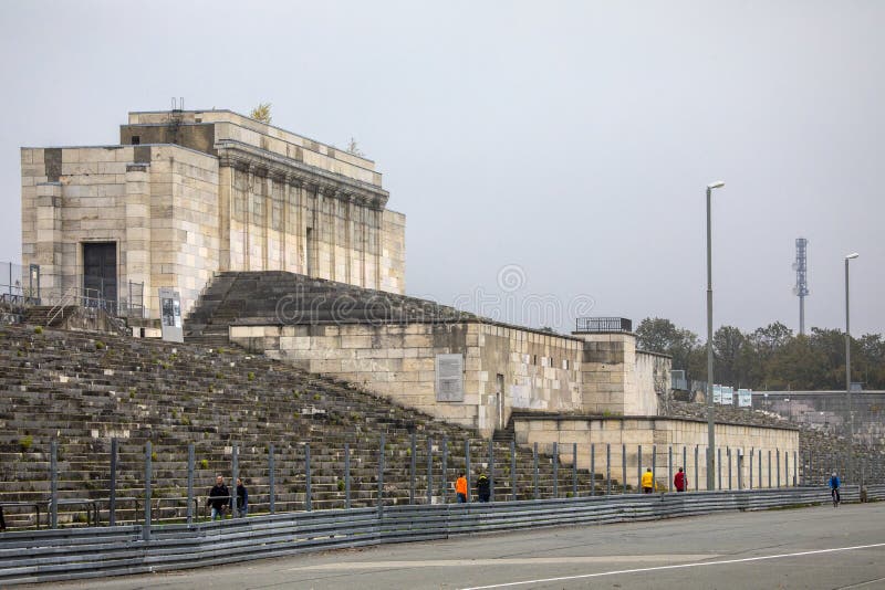 The remains of the historic Zeppelinfeld grandstand in the city of Nuremberg in Germany.  This was the infamous grandstand from which Adolf Hitler made speeches during the Nazi Party Rallies from 1933-1938. The remains of the historic Zeppelinfeld grandstand in the city of Nuremberg in Germany.  This was the infamous grandstand from which Adolf Hitler made speeches during the Nazi Party Rallies from 1933-1938