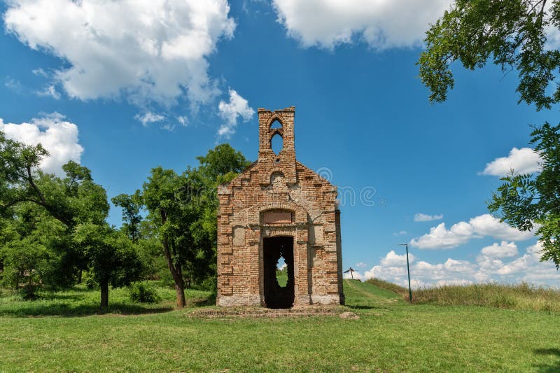 Remains of old ruined monastery church on the hill above small town of Titel in Vojvodina, Serbia.