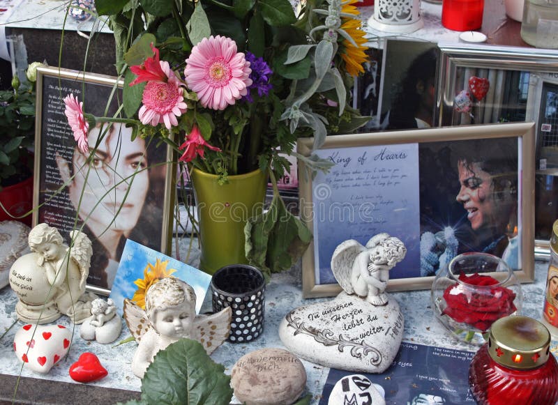 Souvenirs of Michael Jackson placed around a statue at Promenadenplatz in Munich, Germany to remember the anniversary of death of Michael Jackson. Picture taken on June 26th, 2010. Souvenirs of Michael Jackson placed around a statue at Promenadenplatz in Munich, Germany to remember the anniversary of death of Michael Jackson. Picture taken on June 26th, 2010.