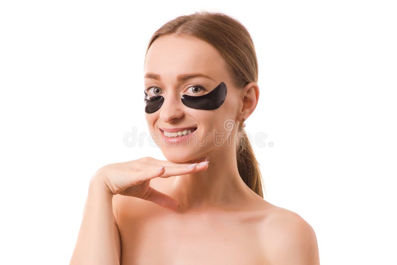 Remendos bonitos da cara da jovem mulher sob os olhos fotos de stock royalty free Remendos bonitos da cara da jovem mulher sob os olhos fotos de stock royalty free