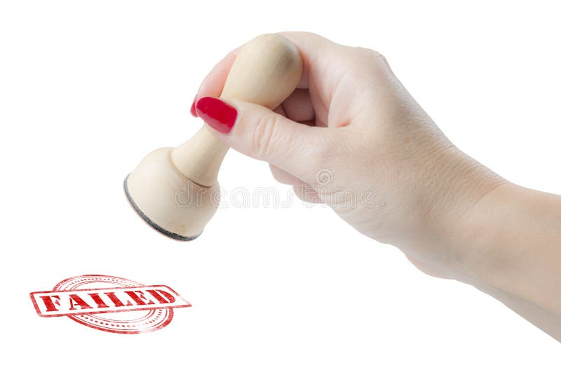 Hand holding a rubber stamp with the word failed isolated on a white background. Hand holding a rubber stamp with the word failed isolated on a white background