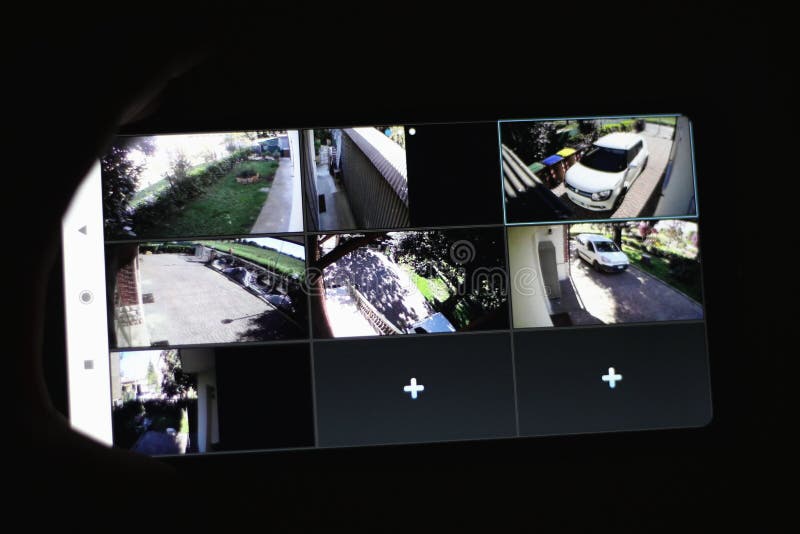 Remote control by smartphone. Anti theft system with alarms and cameras controlled through smartphone in a private building.