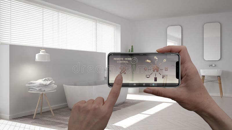 Remote home control system on a digital smart phone tablet. Device with app icons. Interior of minimalist white bathroom in the ba royalty free stock images