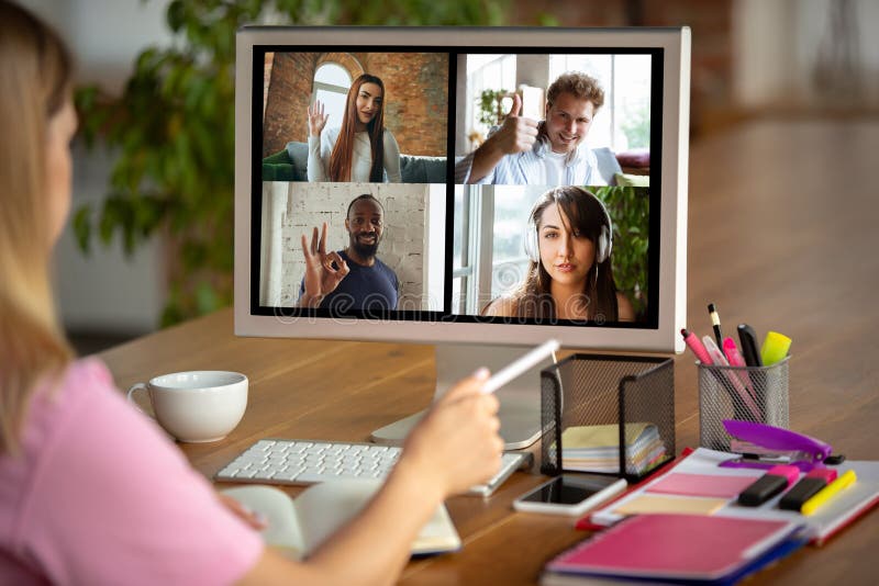 Remote meeting. Woman working from home during coronavirus or COVID-19 quarantine, remote office concept. stock images