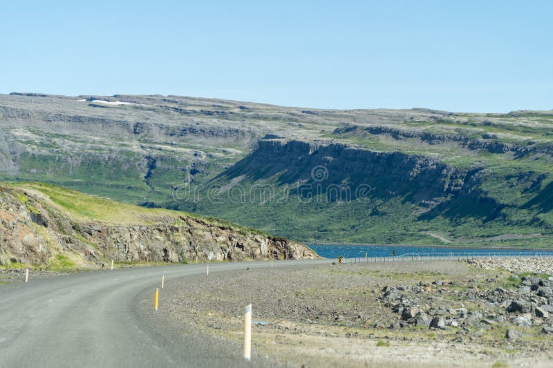 Remote roads through the Westfjords in Iceland, on a sunny day royalty free stock photography