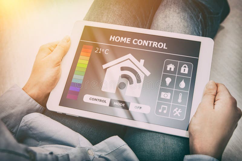 Remote smart home control system on a digital tablet. stock photo Remote smart home control system on a digital tablet. stock photo