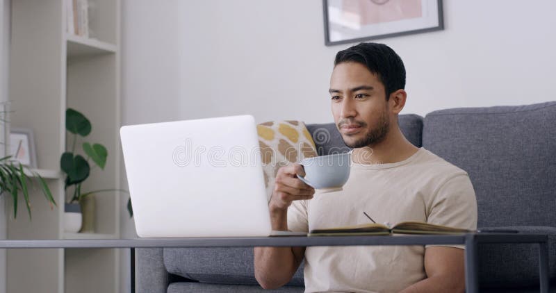 Remote work from home, coffee and man with laptop, online reading and copywriting with email. Freelancer, writer and stock photos