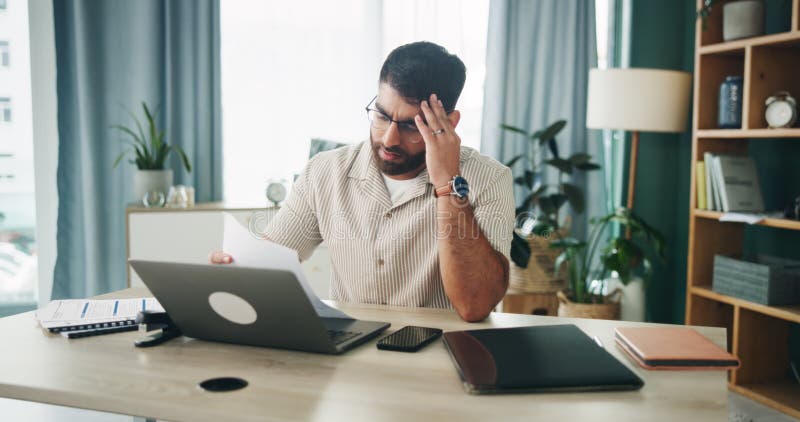 Remote work from home, headache and man with computer, fatigue or overwhelmed with deadline. Person, freelancer or stock photography