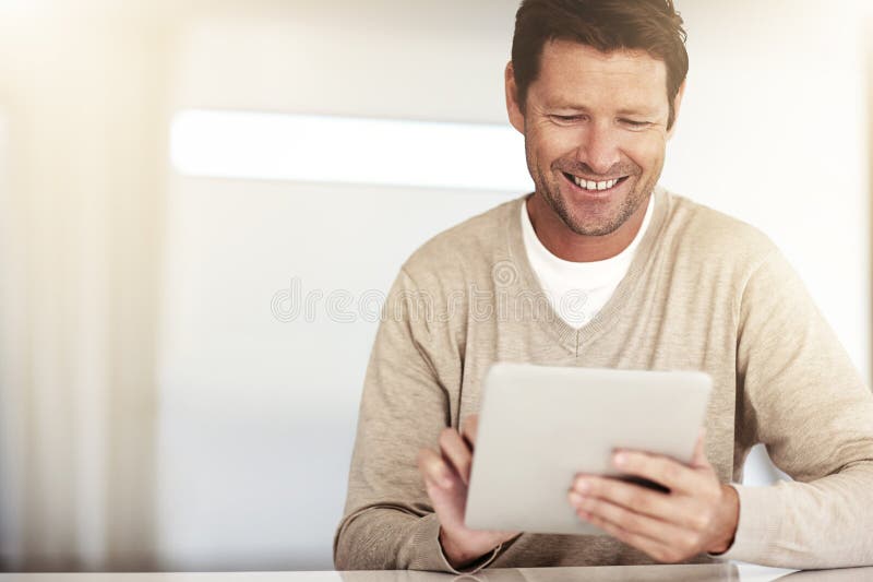 Remote work, smile or man in home with tablet, article edit or source contact for online magazine. WFH, space or stock image