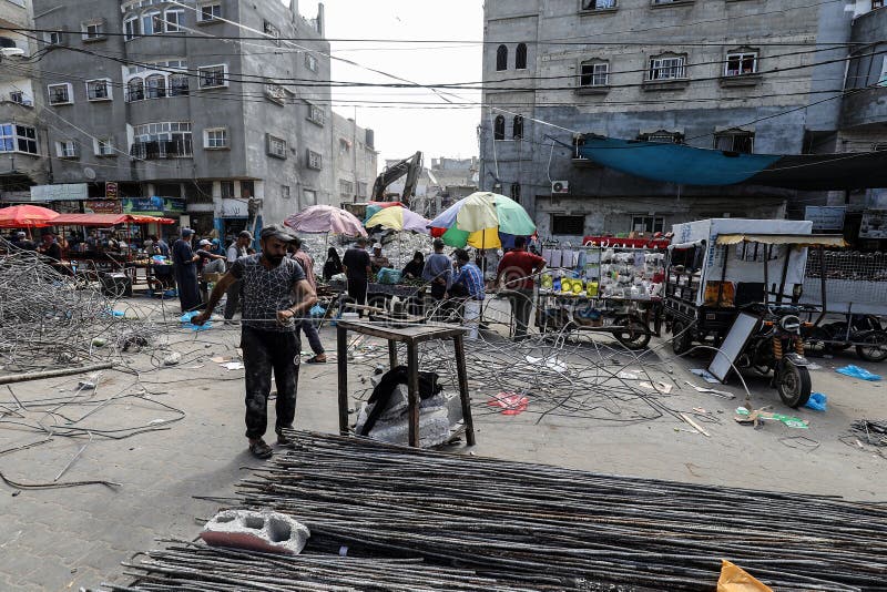 Removal of a residential building that was damaged during the Israeli bombing, in the latest round of escalation on Gaza stock photo