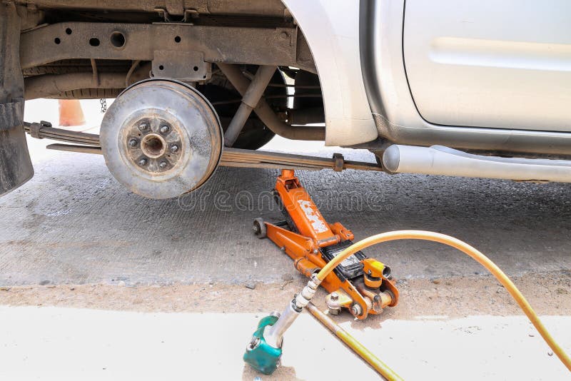 Remove Wheel by Car Jack for Repair with Tool. Stock Photo Image of