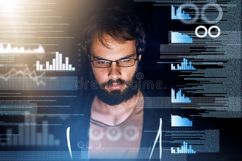 Removing any glitches. a young computer programmer working on source code. stock photo