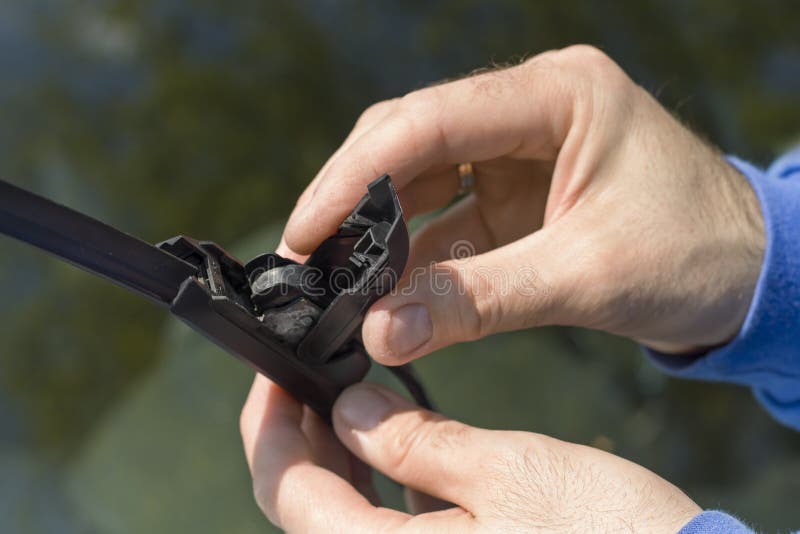 Removing the Damaged Wiper from the Arm. Stock Image Image of