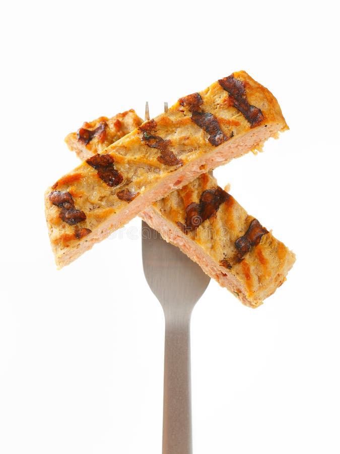 Remsor av den grillade hamburgaren royaltyfri foto Remsor av den grillade hamburgaren royaltyfri foto