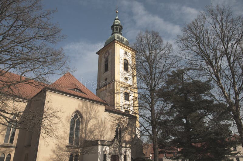 The renaissance church with trees and sky