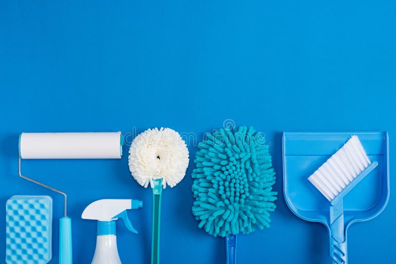 Cleaning tools blue background.housecleaning. Cleaning tools blue background.housecleaning.