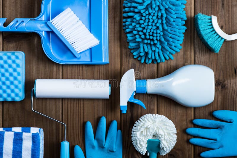 Cleaning tools blue background.housecleaning. Cleaning tools blue background.housecleaning.