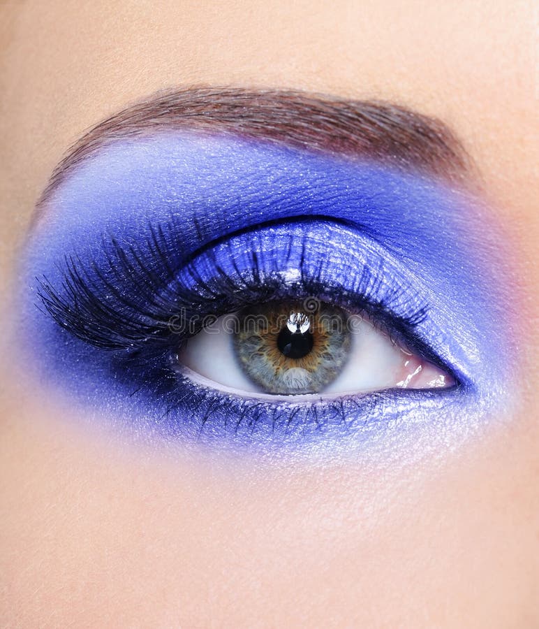 Renivellement bleu de mode d'oeil de femme photo stock Renivellement bleu de mode d'oeil de femme photo stock
