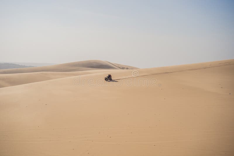 Rent a Car for Driving on the Sand Dunes. 4 Wheel Drive Sand Car Stock