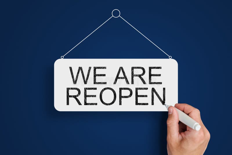 Reopen Concept. Hand Draws a Sign that Says we are Reopen. Stock Photo