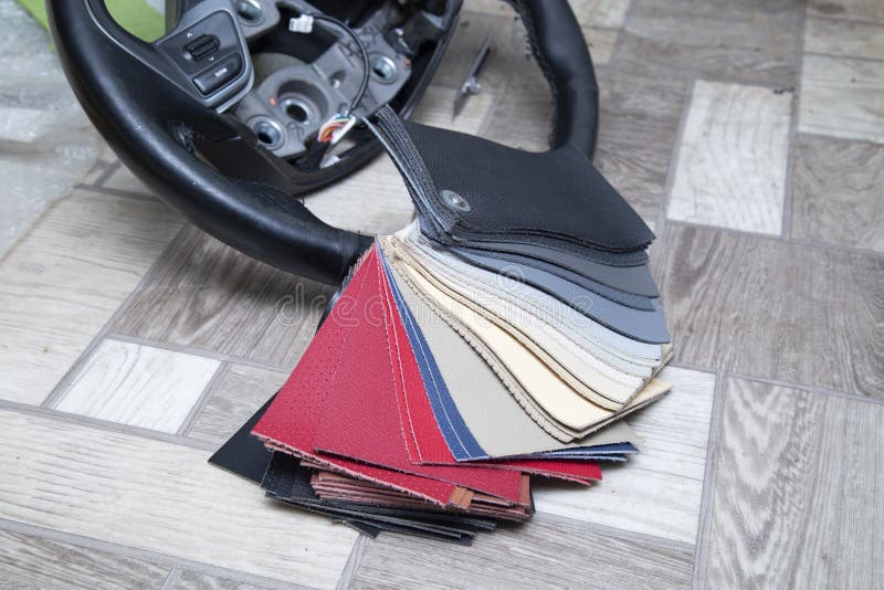 Repair of Car Seats and Steering Wheels. Car Interior Repairs Stock