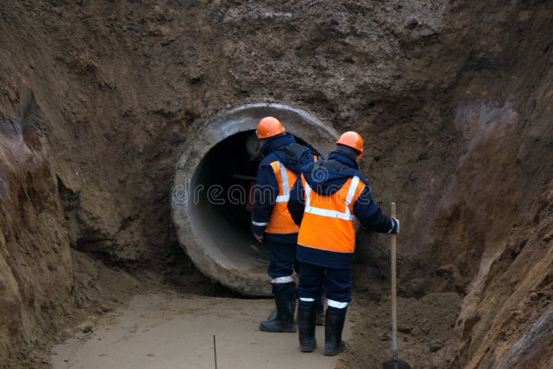 Repair of city water supply. Replacement of old rusty metal pipes on plastic pipes. New modern technologies of urban engineering n