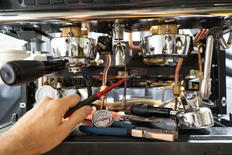 Repair of the coffee machine photo. royalty free stock photography