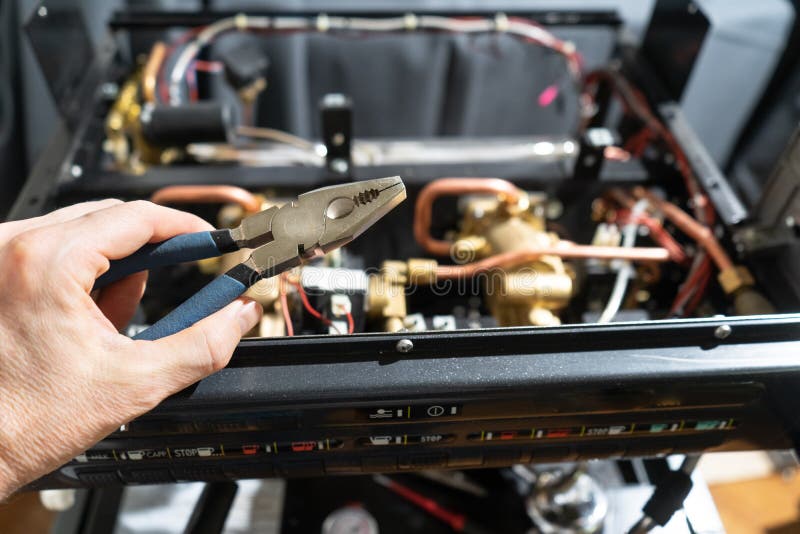 Repair of the Coffee Machine Photo. Stock Image Image of master, instrument 203377257