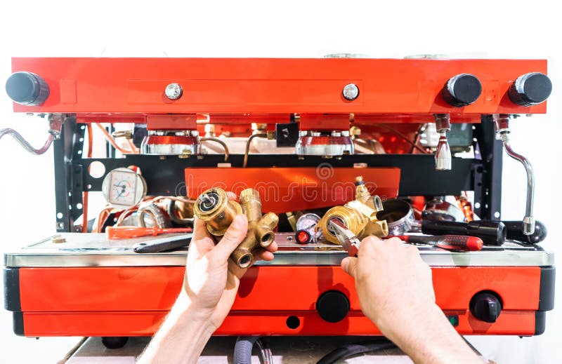 Repair of the Coffee Machine Photo. Stock Photo Image of place