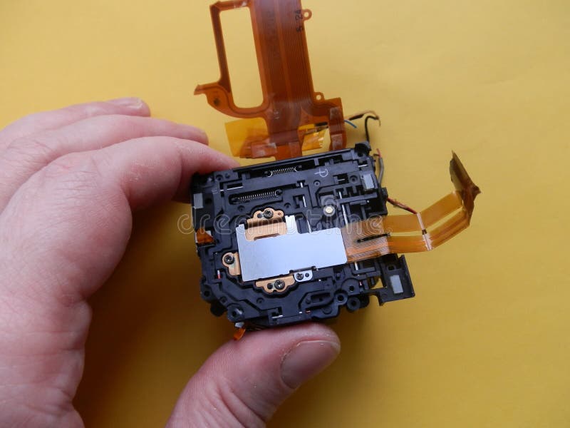 Repair and Disassembly of a Pocket Digital Camera Stock Image Image