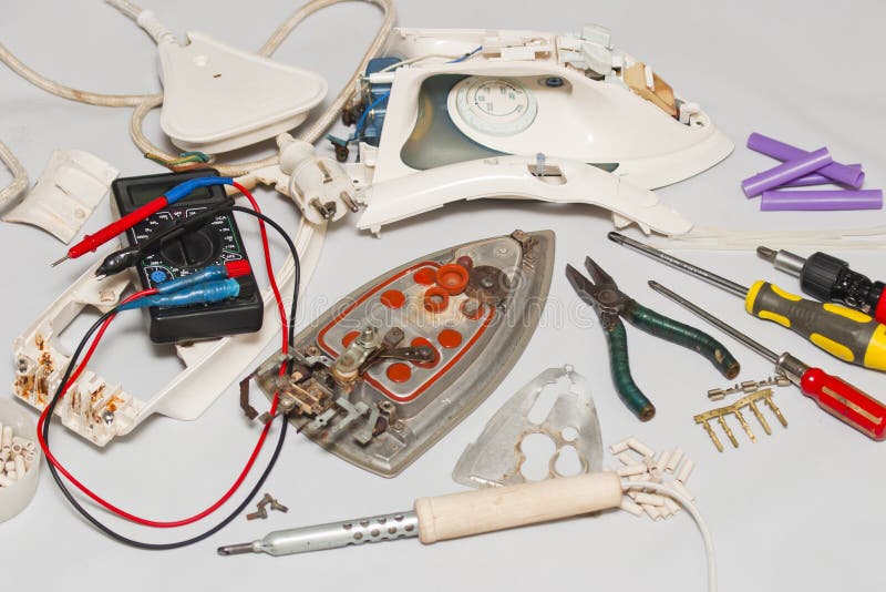 Repair of the iron stock image. Image of disassemble 207112147