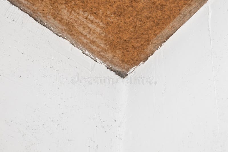 Repair of the Joint of the Two White Plaster Walls Corner at the