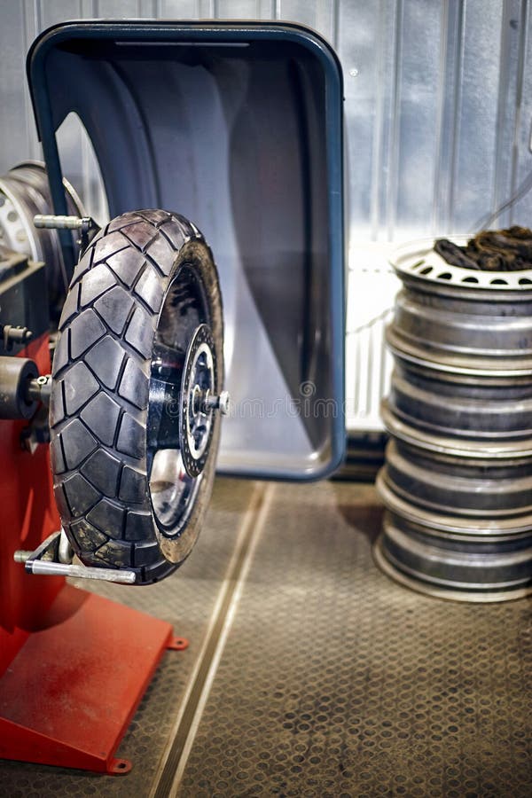 Repair and Maintenance of Motorcycle Wheels on the Service Stock Photo