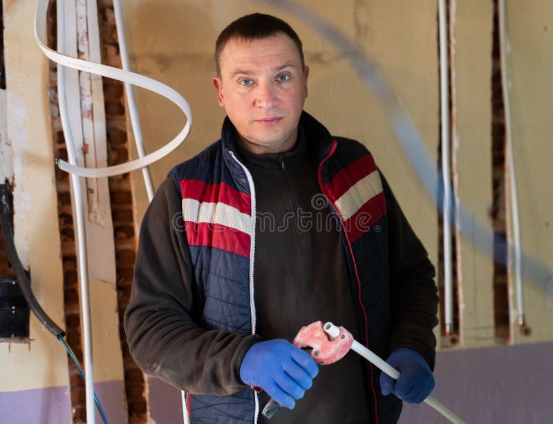 Repair Man Cutting Cable Duct for Wires Stock Image Image of russian