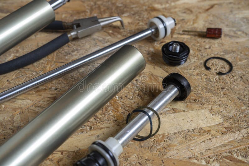 Repair Mountain Bike Front Fork with Snapring Pliers Stock Image