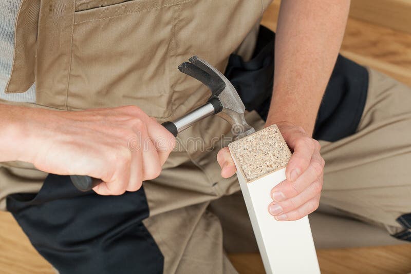 Repair of the table leg stock image. Image of wood, manual 34815737