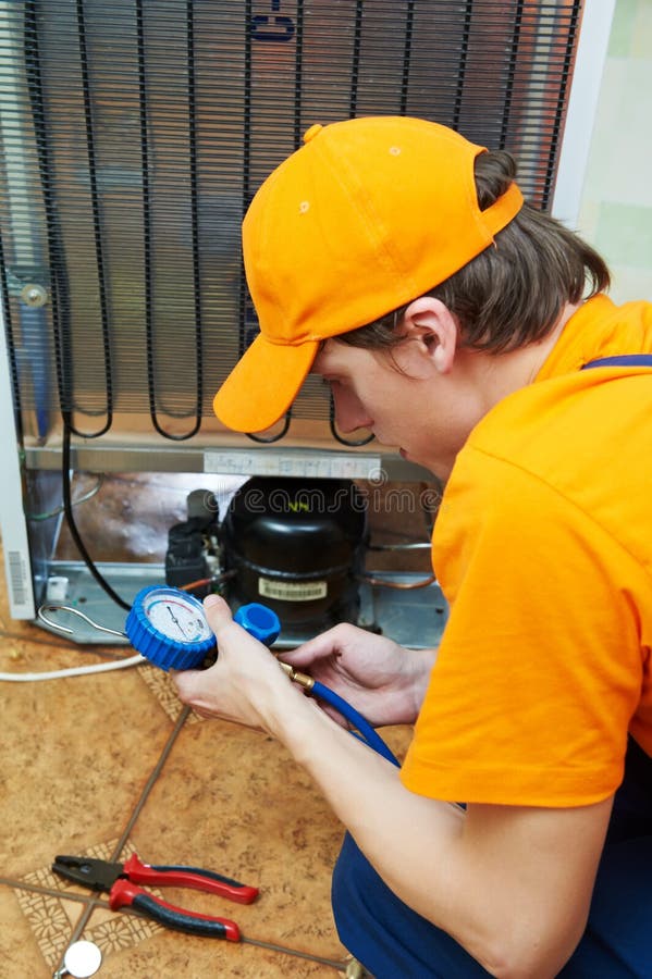 Repair work on fridge appliance