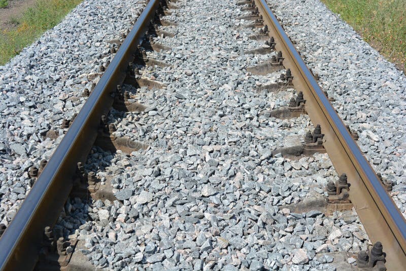 Repaired Railroad Tracks for Freight Trains with Updated Gray Stone